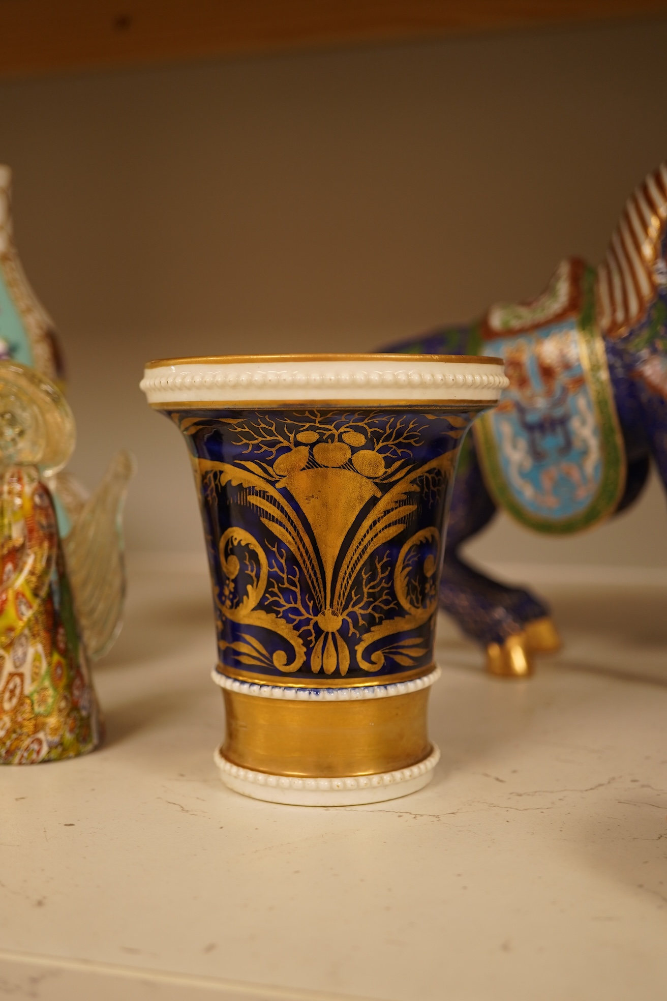 A Chinese cloisonné enamel horse and vase, two miniature Rockingham floral teapots, a malachite box etc (9). Cloisonné horse 20cm long.